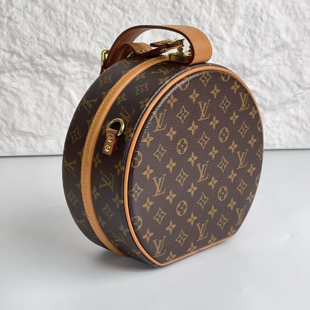 Louis Vuitton Petite Boîte Chapeau in Monogram Canvas with Gold‑Tone Hardware