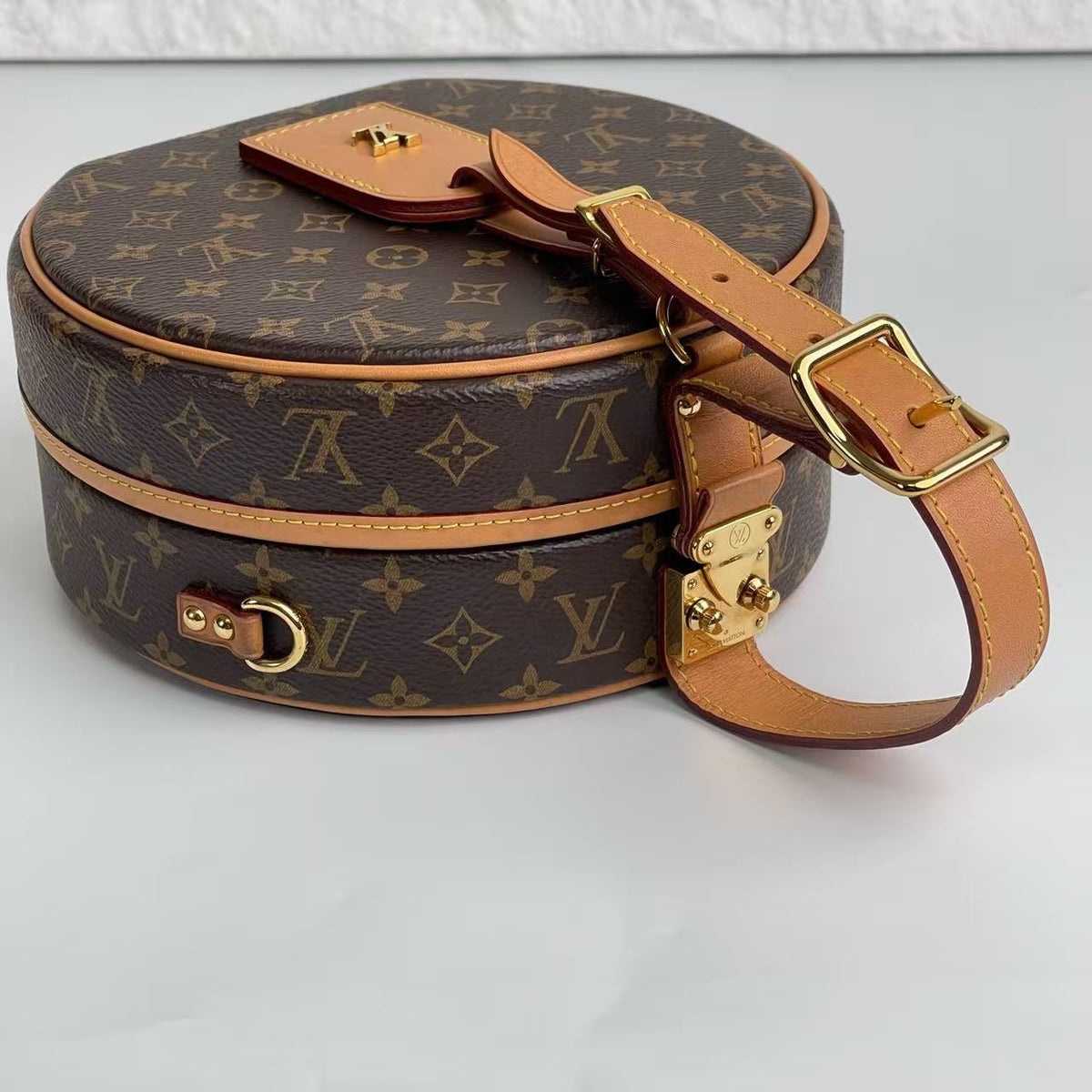 Louis Vuitton Petite Boîte Chapeau in Monogram Canvas with Gold‑Tone Hardware