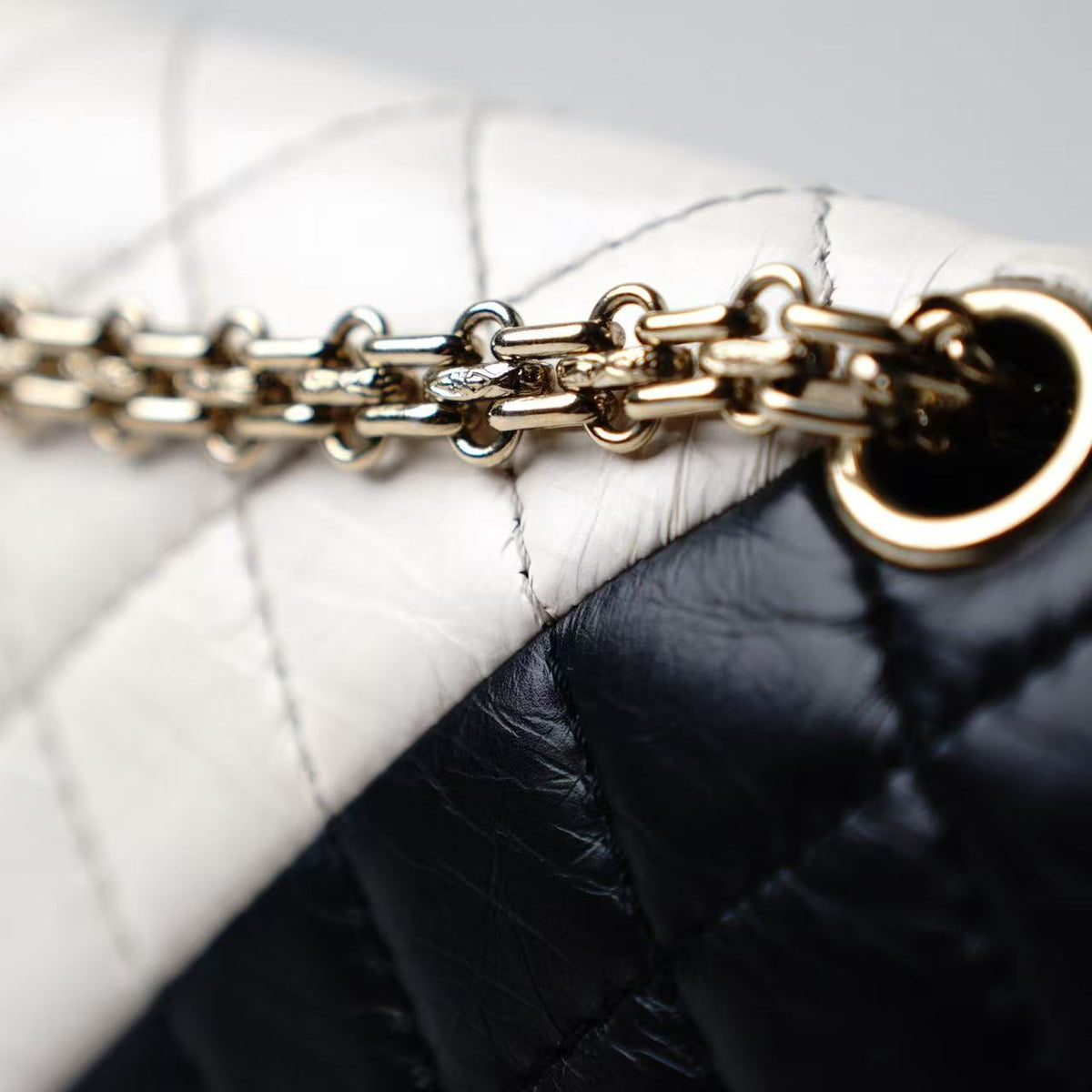 Chanel 2.55 Reissue Black‑White Color‑Block Flap Shoulder Bag